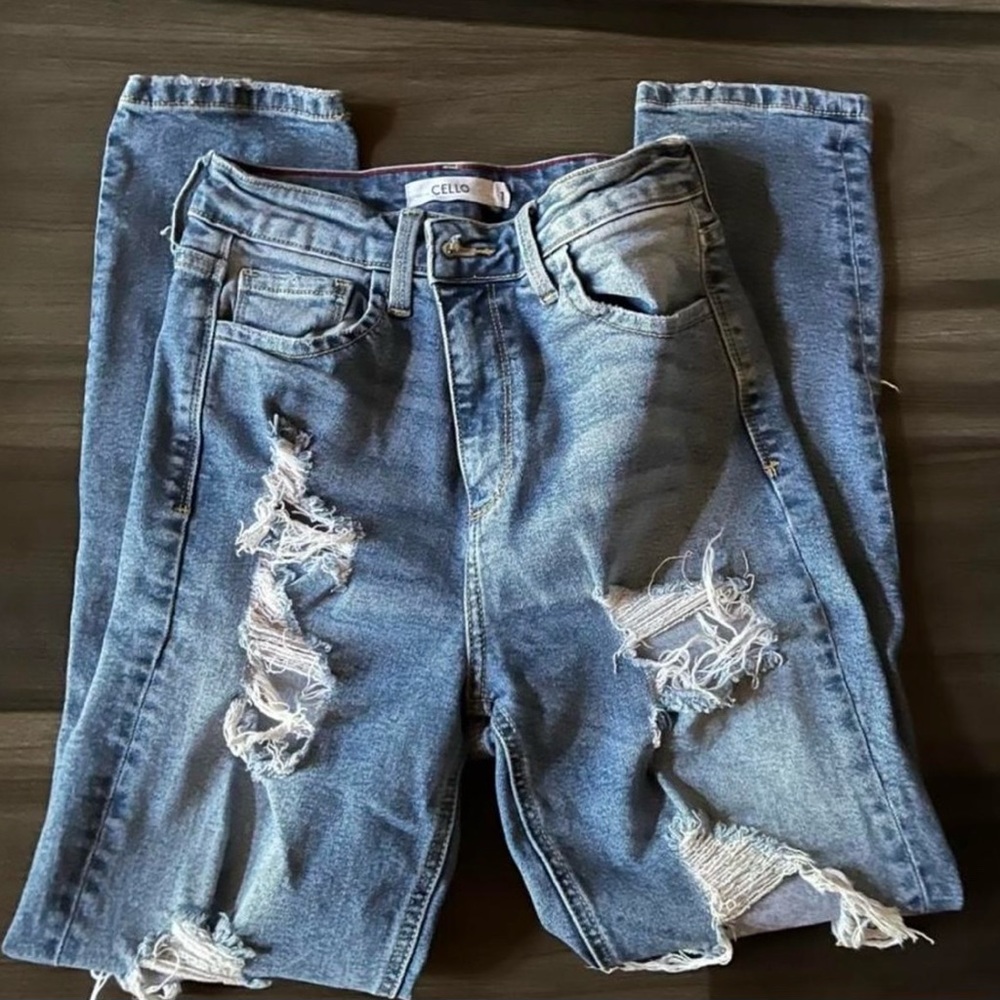 light blue high waisted ripped jeans.